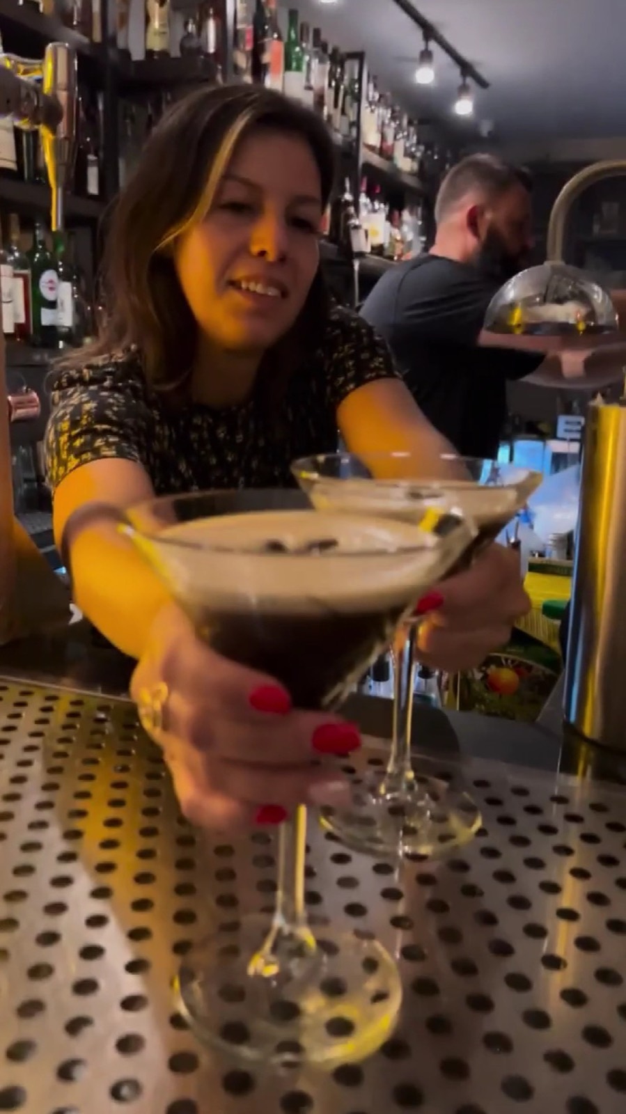 Drinks and plates served at the bar.
